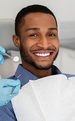 Patient in Londonderry smiling after dental checkup